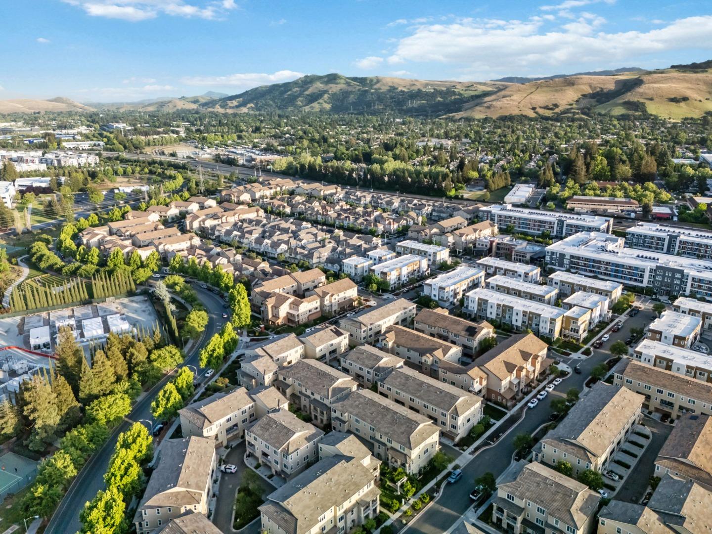 5977 Larkstone Loop San Jose, CA 95123 - Photo 60 of 63 an aerial view of a city with lots of residential buildings