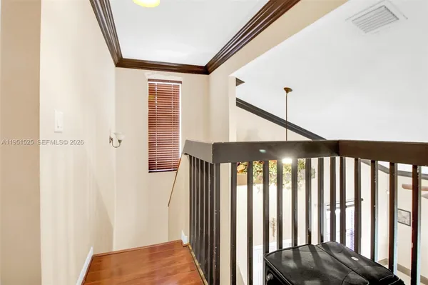 a bedroom with furniture and window