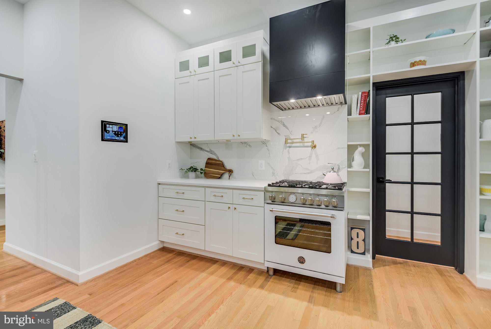 17 Ritchie Avenue Silver Spring, MD 20910 - Photo 13 of 38 The Hood is sleek! Bertazzoni stove too!