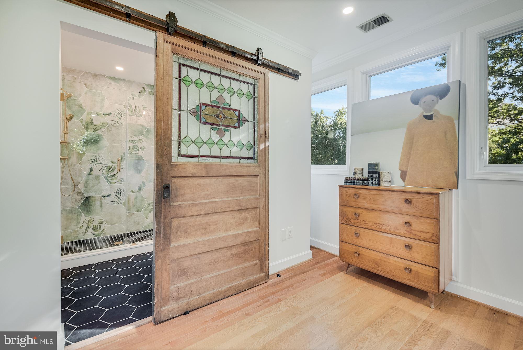 17 Ritchie Avenue Silver Spring, MD 20910 - Photo 18 of 38 Stained glass custom door to primary bath.