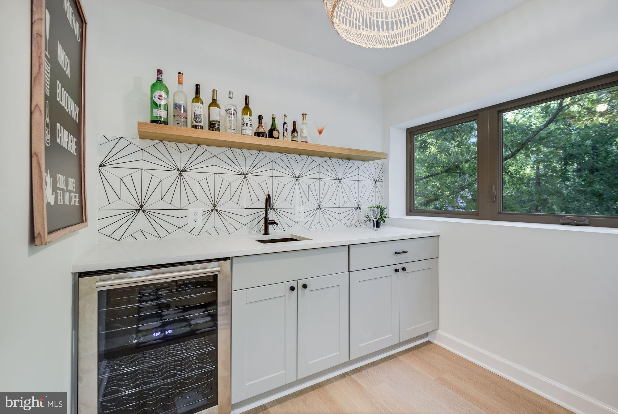 17 Ritchie Avenue Silver Spring, MD 20910 - Photo 24 of 38 Sleek wet bar in family room. Potential kitchen.
