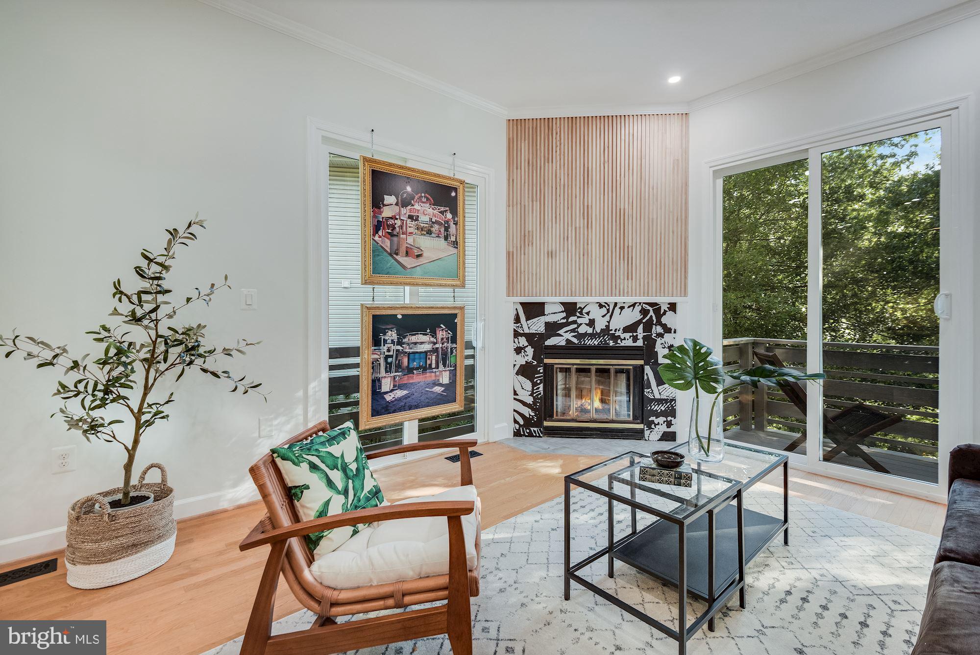17 Ritchie Avenue Silver Spring, MD 20910 - Photo 7 of 38 High ceilings and tree top views in living room.