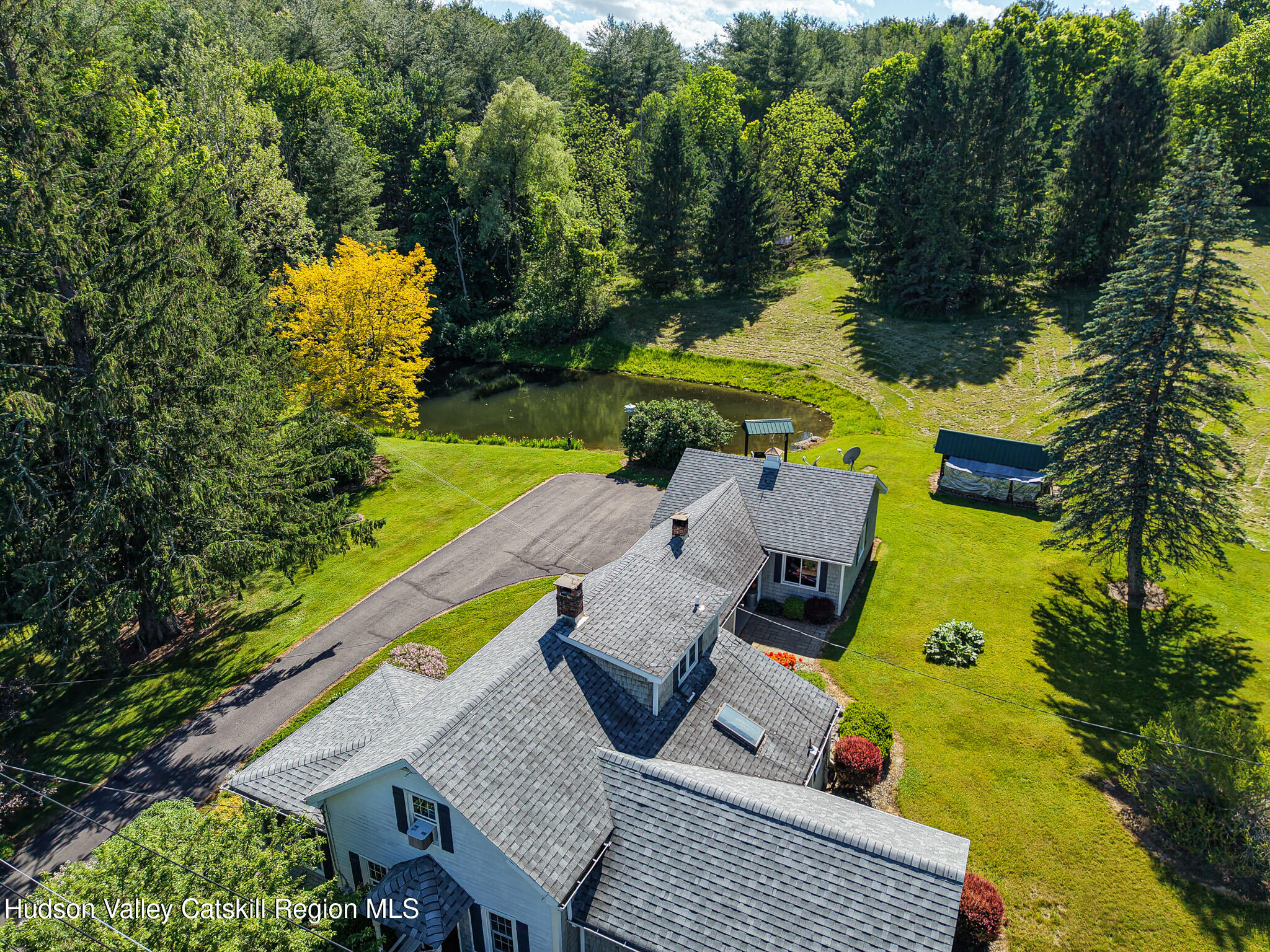 221 Camp Medusa Road Rensselaerville, NY 12120 - Photo 31 of 57 an aerial view of a house with a swimming pool