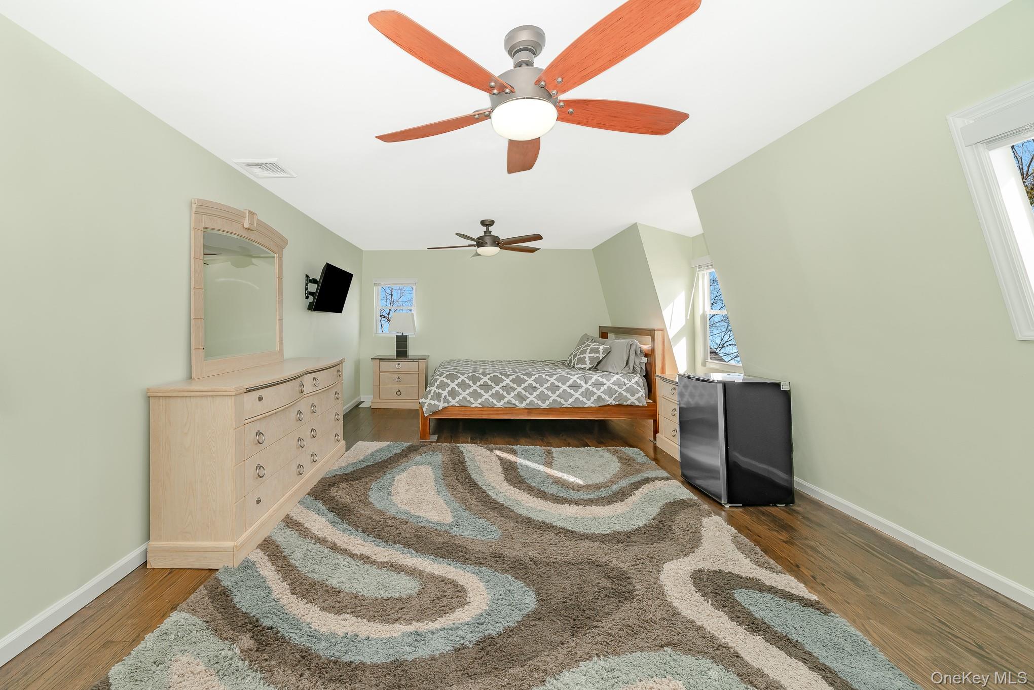 2431 Riverside Drive Wantagh, NY 11793 - Photo 16 of 23 a living room with furniture and a fireplace