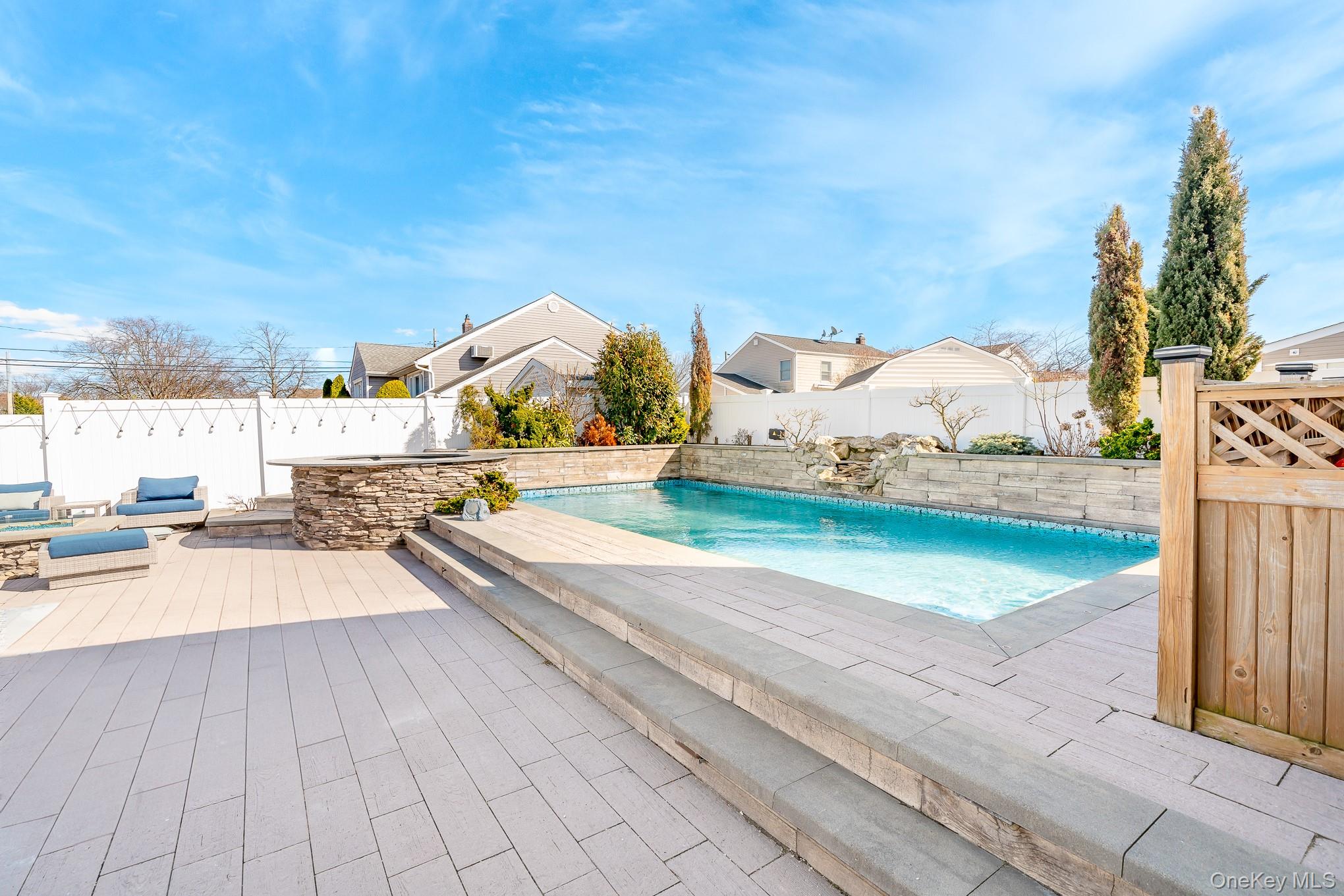 2431 Riverside Drive Wantagh, NY 11793 - Photo 2 of 23 swimming pool view with a outdoor space