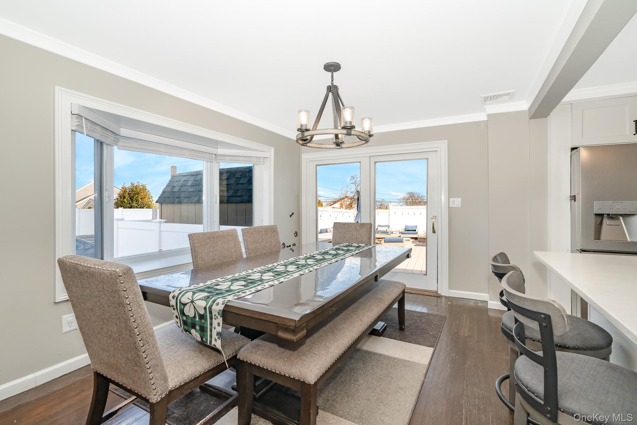 2431 Riverside Drive Wantagh, NY 11793 - Photo 9 of 23 a view of a dining room with furniture