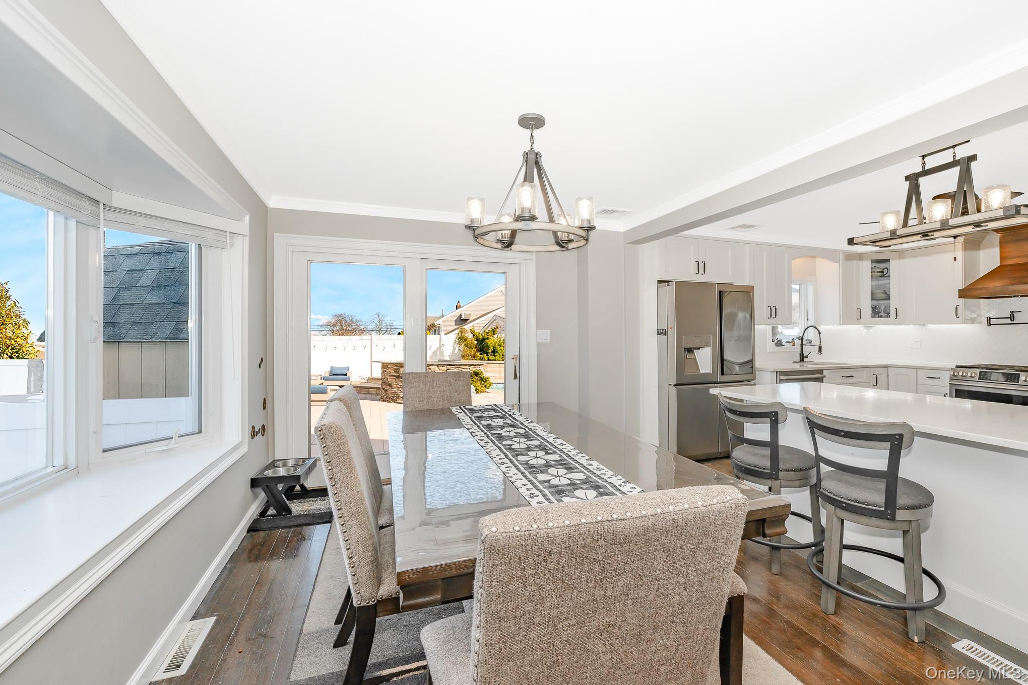 2431 Riverside Drive Wantagh, NY 11793 - Photo 10 of 23 a view of a dining room with furniture window and outside view