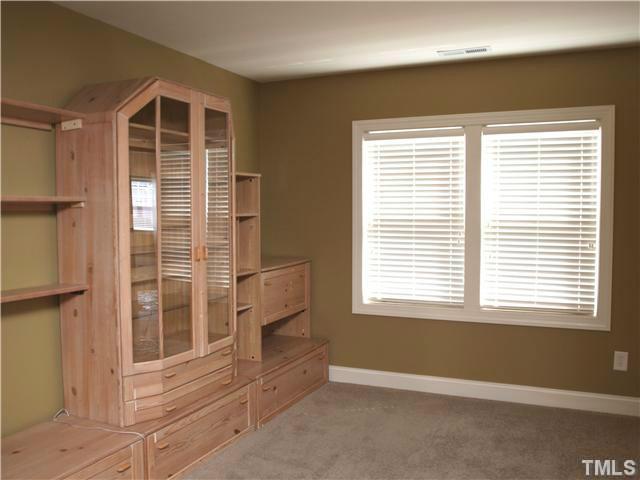 12316 Beestone Lane Raleigh, NC 27614 - Photo 11 of 20 a view of an empty room with a window