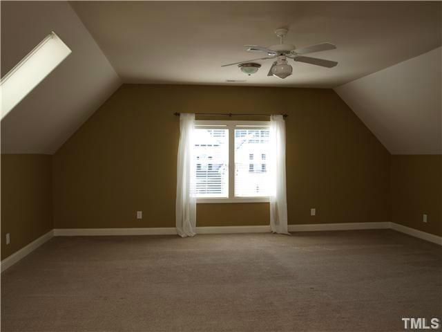 12316 Beestone Lane Raleigh, NC 27614 - Photo 14 of 20 a view of an empty room with a window