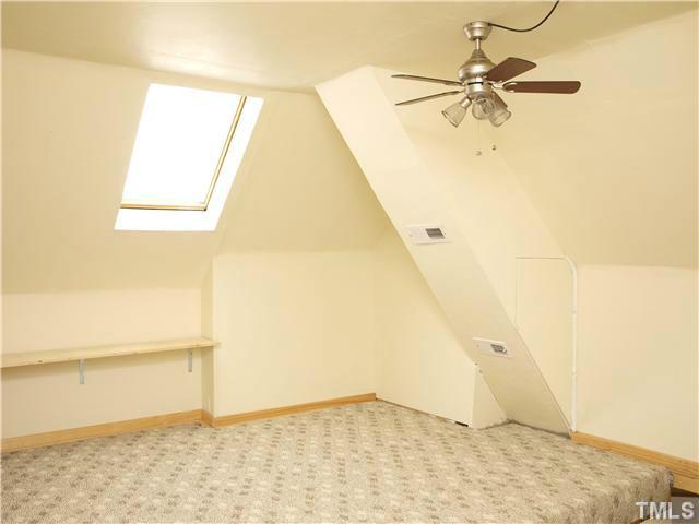 12316 Beestone Lane Raleigh, NC 27614 - Photo 15 of 20 a view of a room with an empty space
