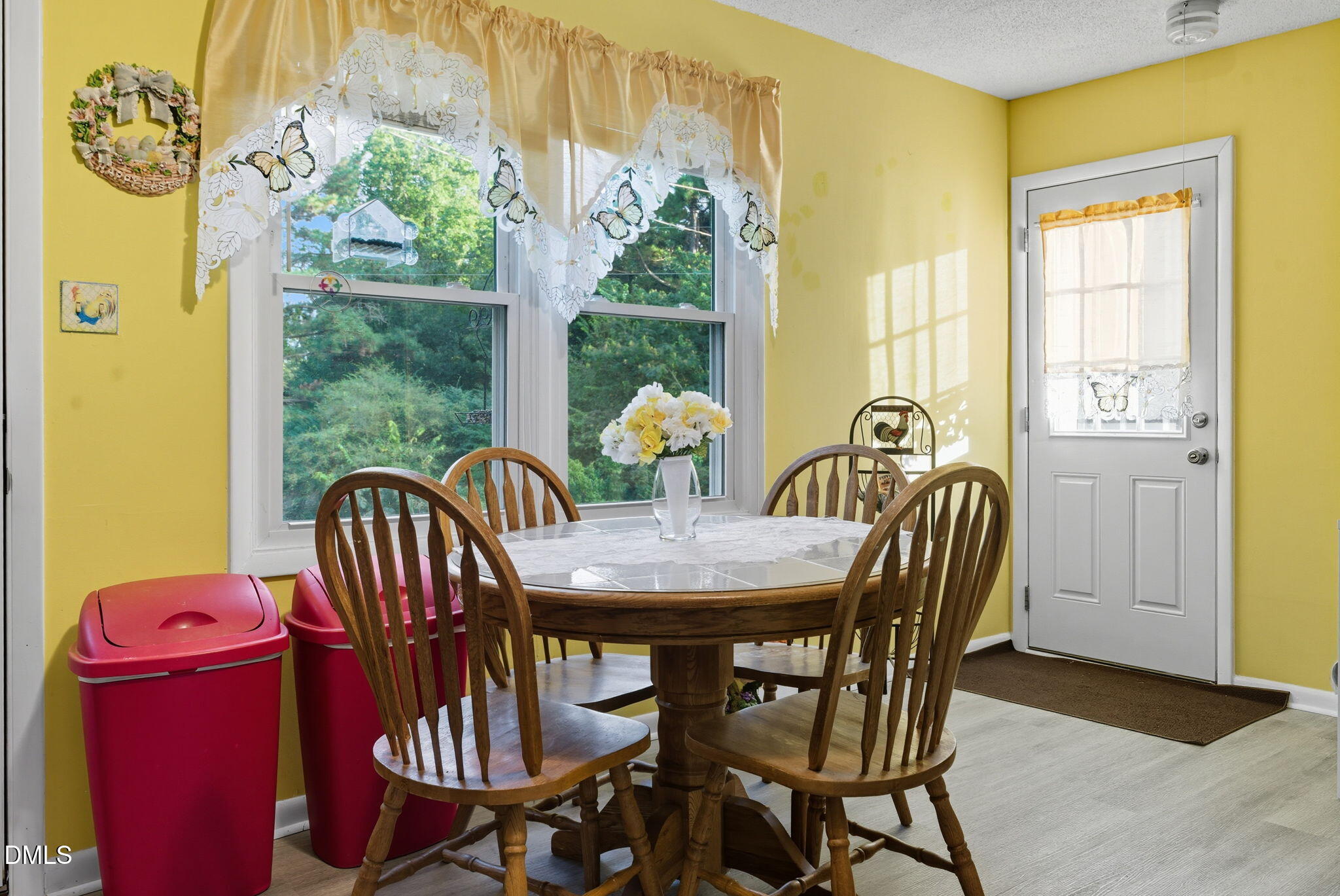 1412 Parks Village Road Zebulon, NC 27597 - Photo 12 of 40 a view of a dining room with furniture window and outside view
