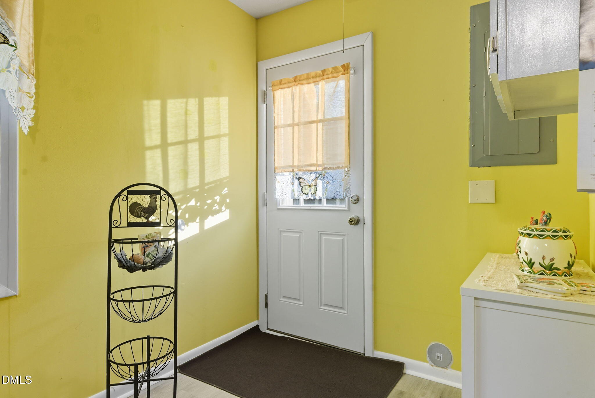 1412 Parks Village Road Zebulon, NC 27597 - Photo 16 of 40 a bathroom with a sink a mirror and a window
