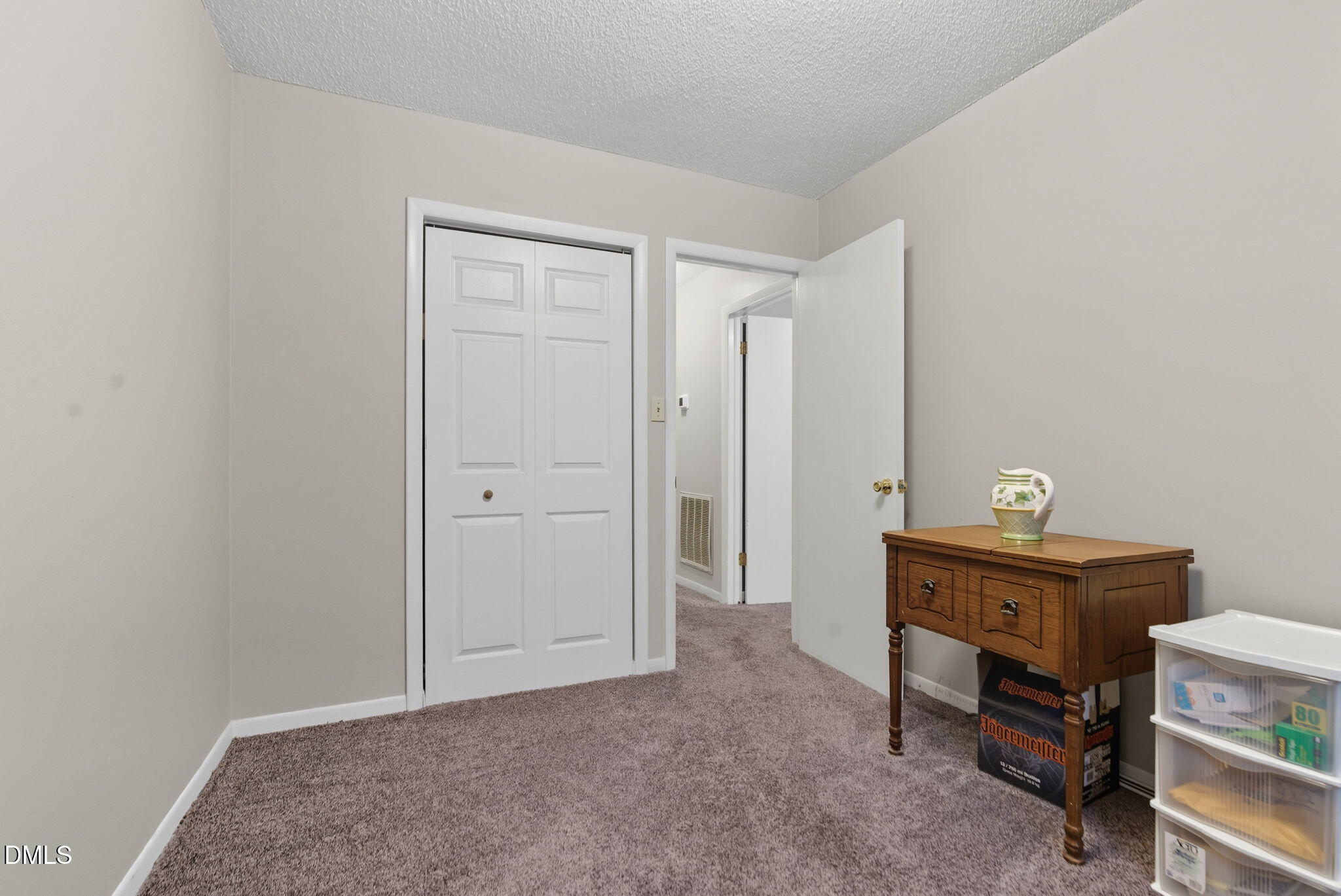 1412 Parks Village Road Zebulon, NC 27597 - Photo 24 of 40 a view of a workspace with furniture