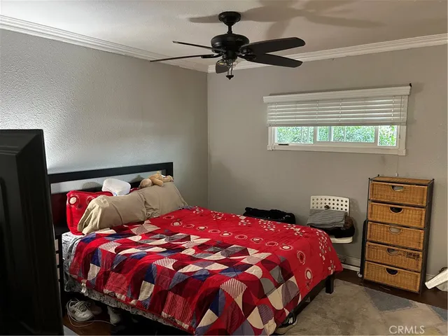 a bedroom with a bed and a closet