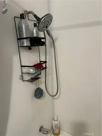 a picture of a glass door with a shower in a room
