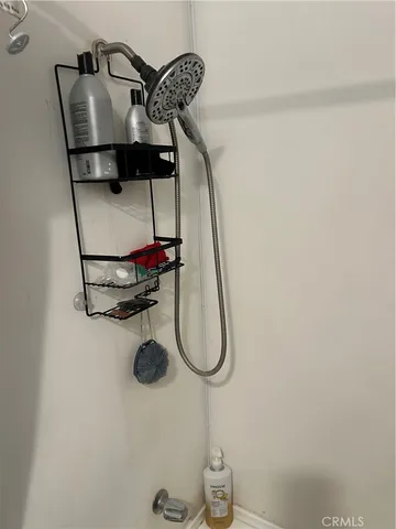 a picture of a glass door with a shower in a room