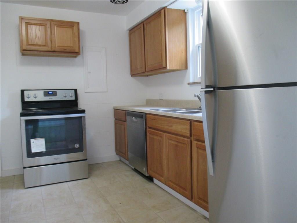 326 Hulton Road Verona, PA 15147 - Photo 6 of 17 NEW STOVE, REFRIGERATOR, AND DISHWASHER