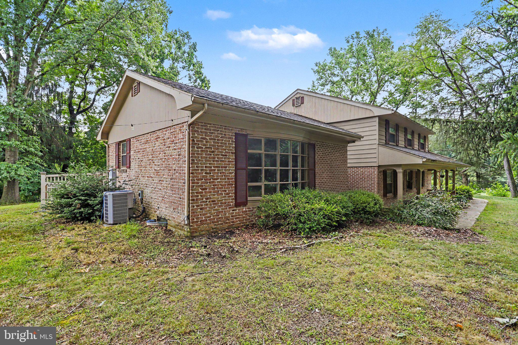 381 Ironstone Ridge Road Lancaster, PA 17603 - Photo 2 of 30 Charming home nestled in lush greenery.