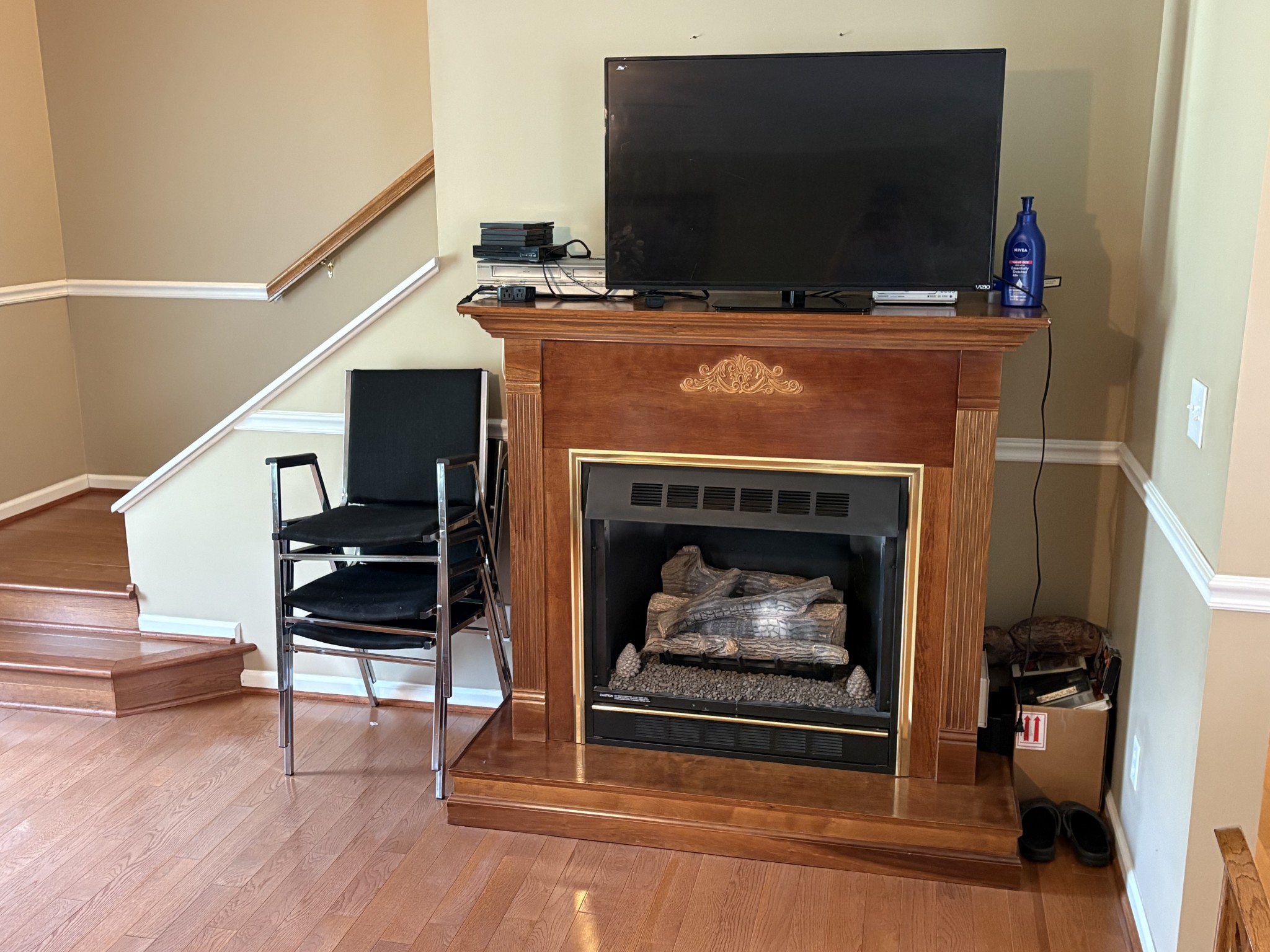 5234 Shellsford Road McMinnville, TN 37110 - Photo 12 of 59 a living room with furniture a fireplace and a flat screen tv