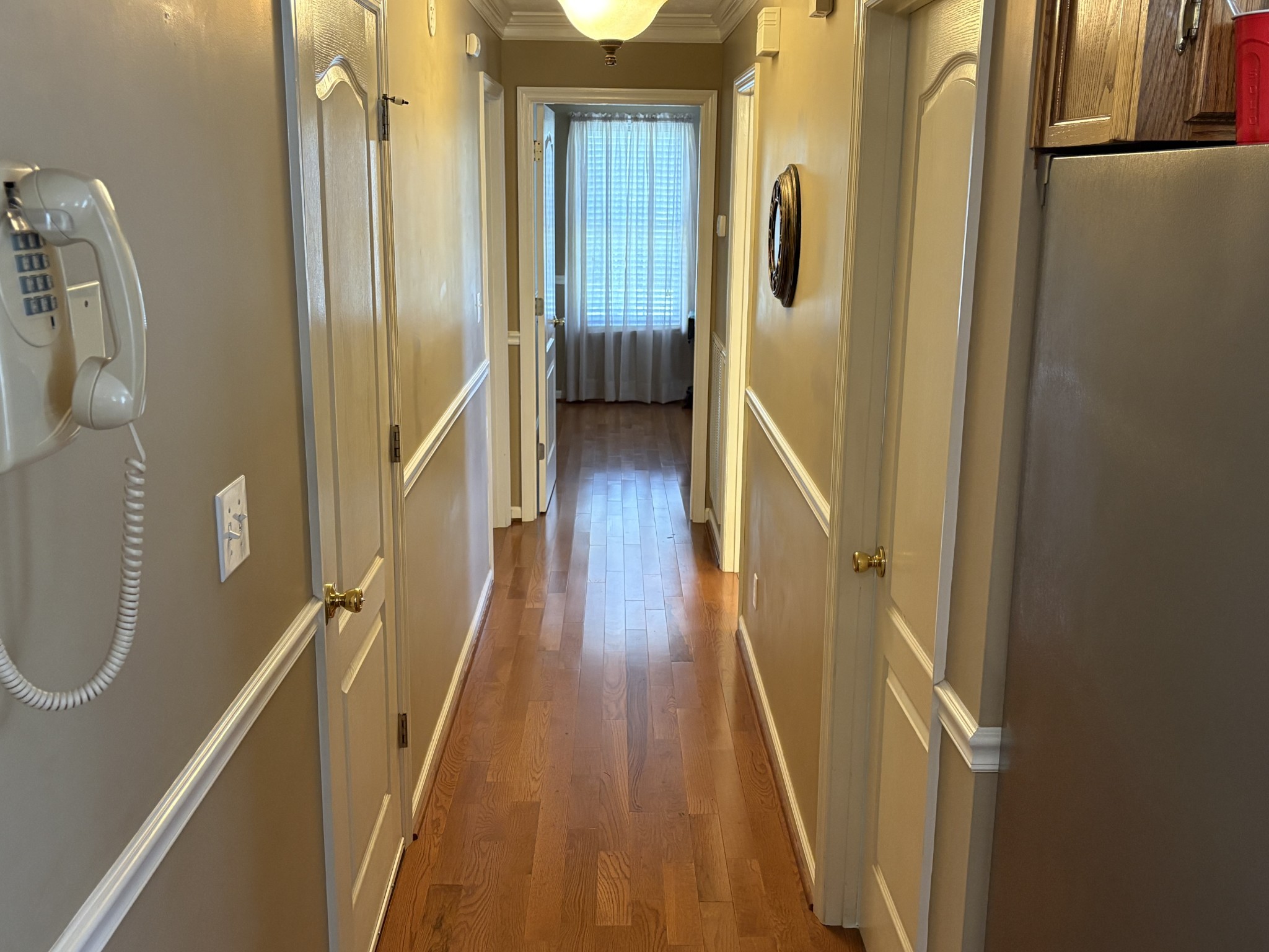 5234 Shellsford Road McMinnville, TN 37110 - Photo 16 of 59 a view of a hallway with wooden floor and staircase