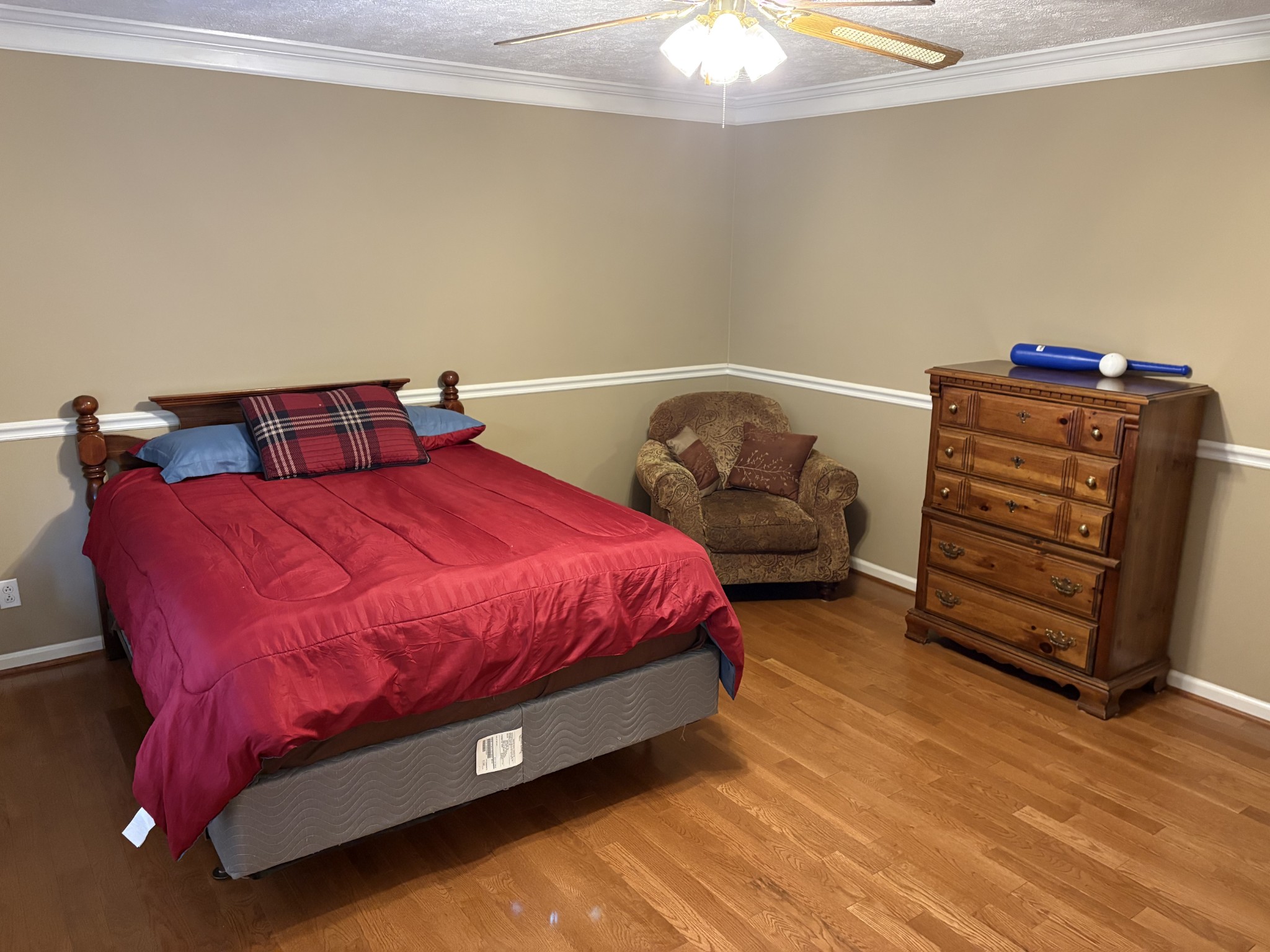 5234 Shellsford Road McMinnville, TN 37110 - Photo 18 of 59 a bedroom with a bed and a chandelier