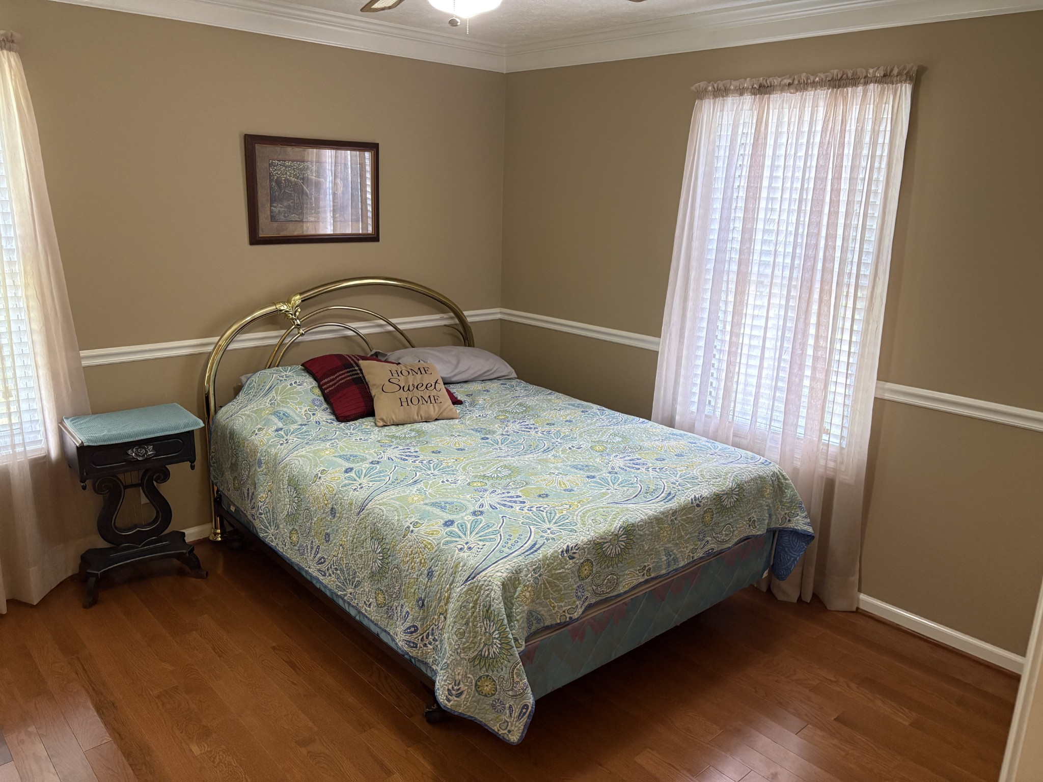 5234 Shellsford Road McMinnville, TN 37110 - Photo 23 of 59 a bed sitting in a bedroom next to a window