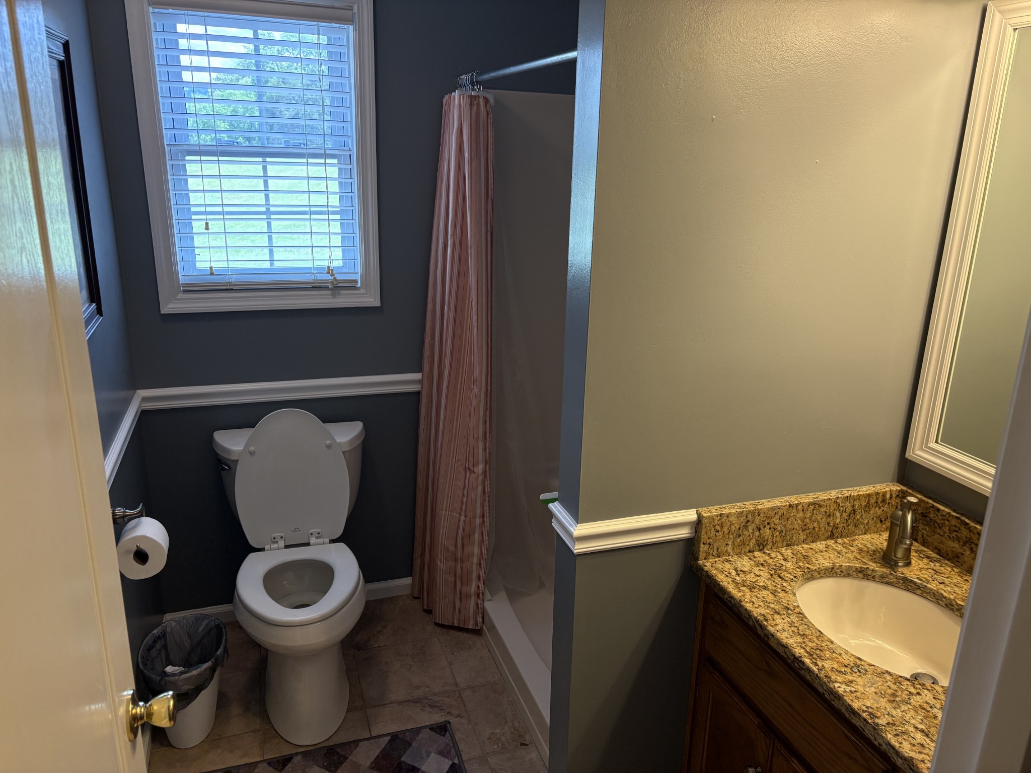 5234 Shellsford Road McMinnville, TN 37110 - Photo 27 of 59 a bathroom with a granite countertop toilet and a sink