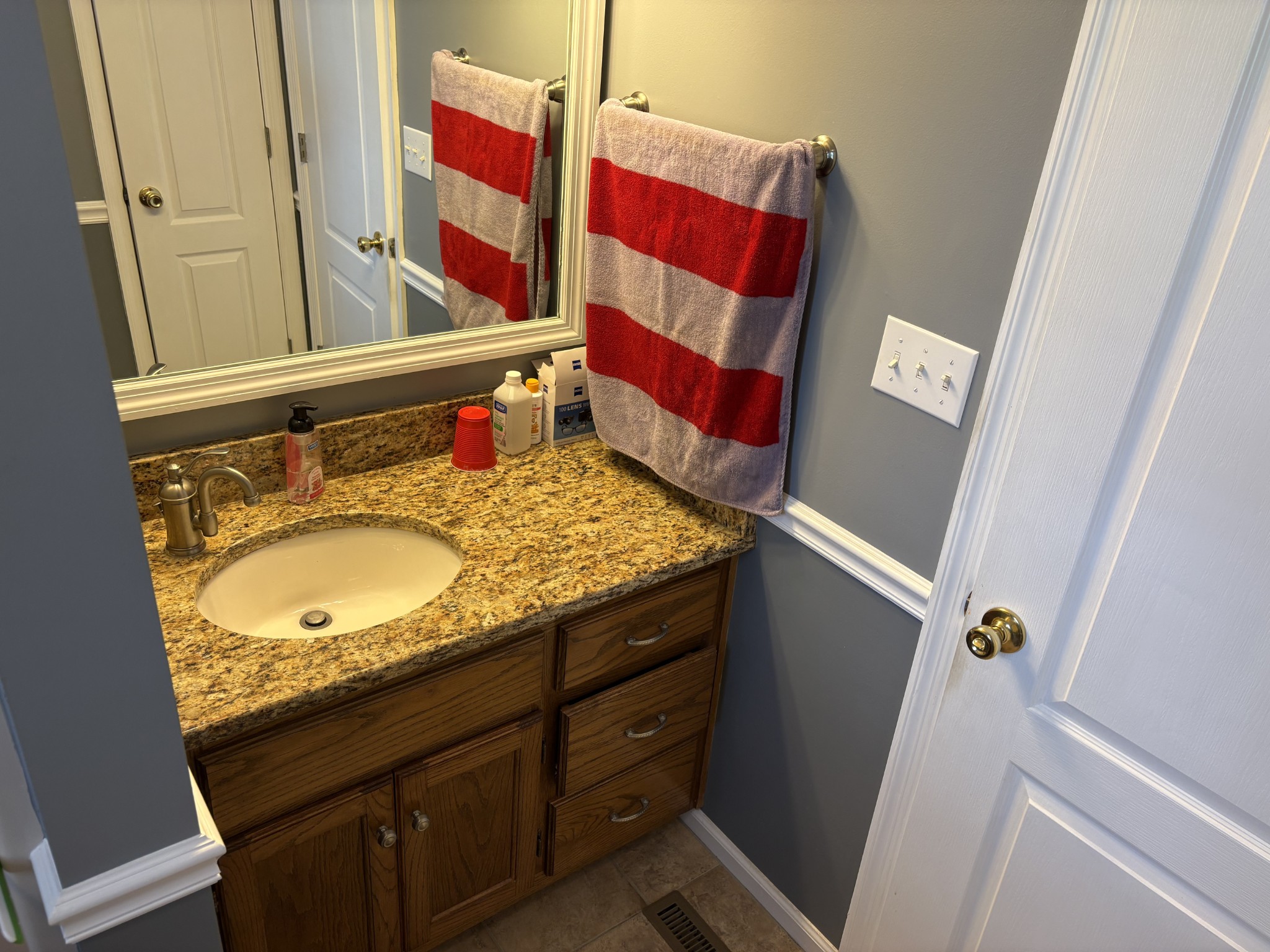 5234 Shellsford Road McMinnville, TN 37110 - Photo 28 of 59 a bathroom with a granite countertop sink and a mirror