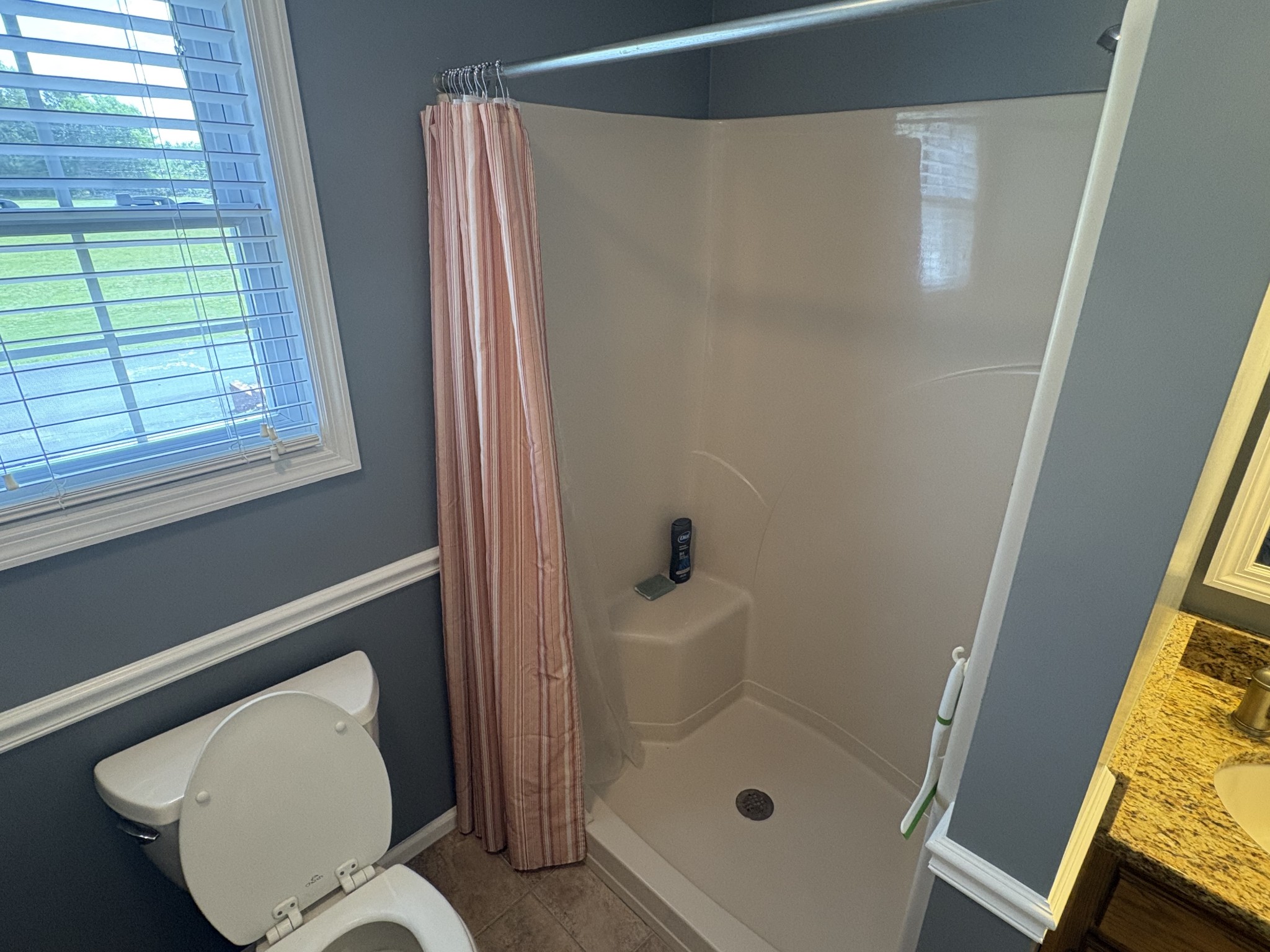 5234 Shellsford Road McMinnville, TN 37110 - Photo 29 of 59 a bathroom with a toilet and a shower