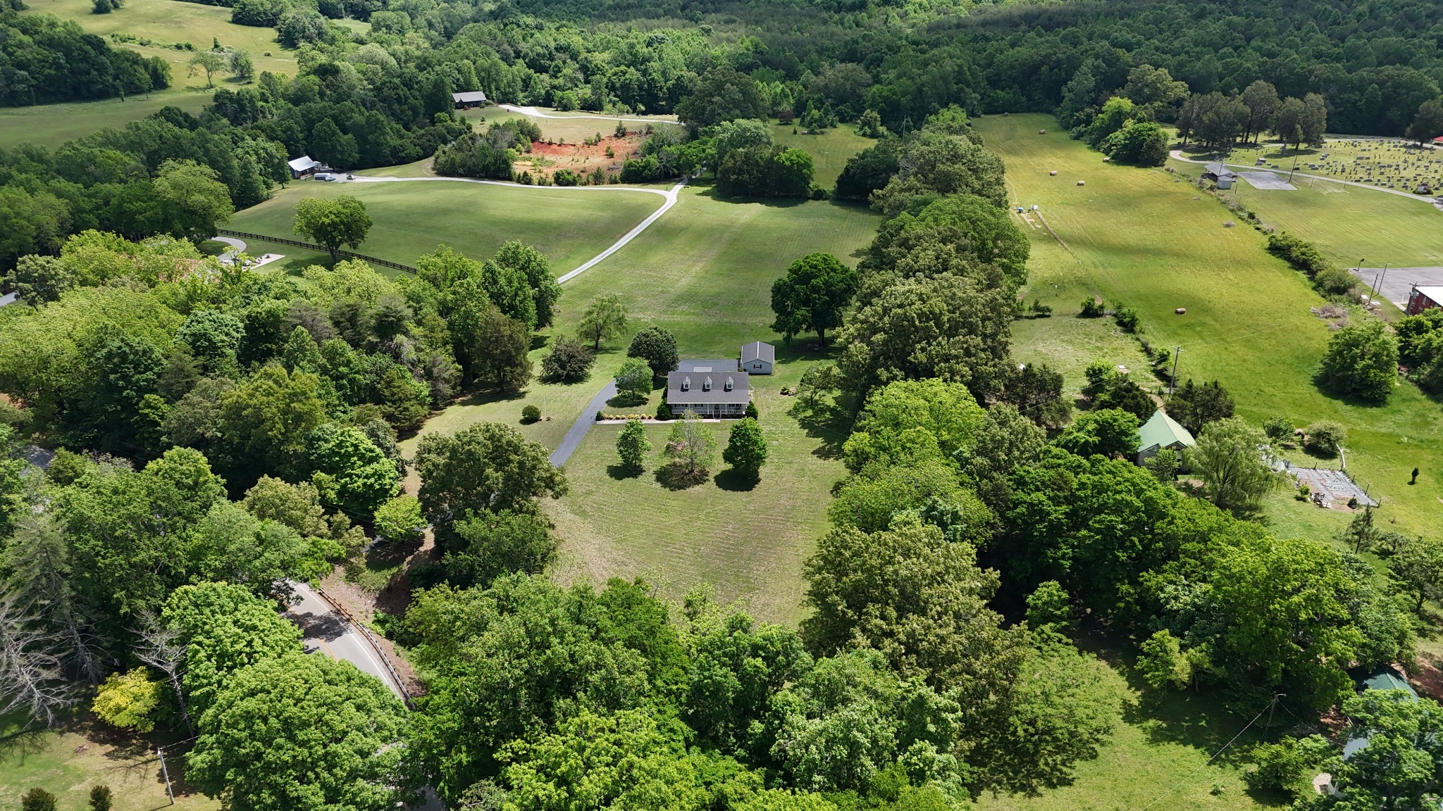 5234 Shellsford Road McMinnville, TN 37110 - Photo 59 of 59 an aerial view of residential house with outdoor space and trees all around
