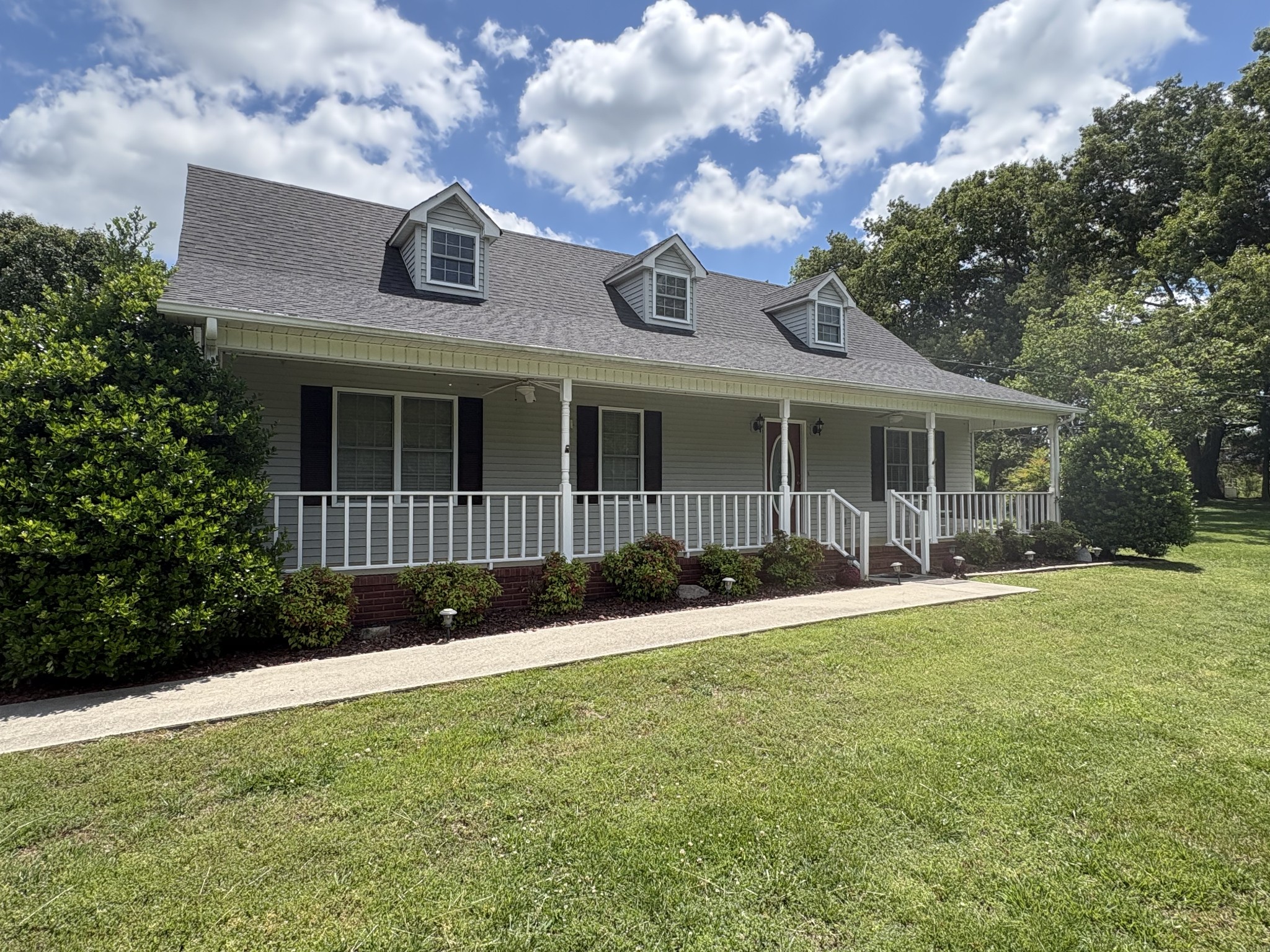 5234 Shellsford Road McMinnville, TN 37110 - Photo 7 of 59 a front view of a house with a garden