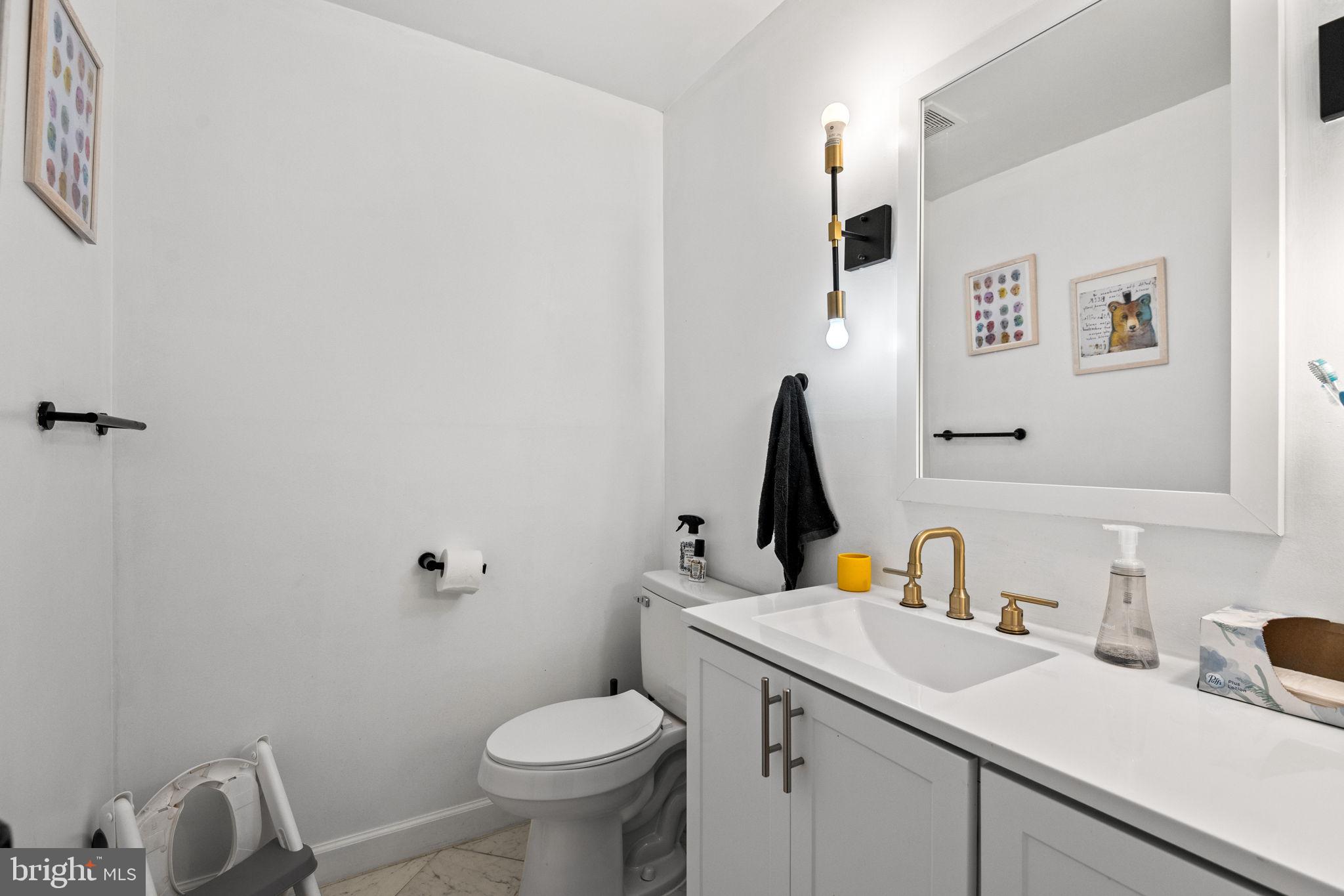 1007 Arcola Avenue Silver Spring, MD 20902 - Photo 10 of 33 Convenient half bath on main level.