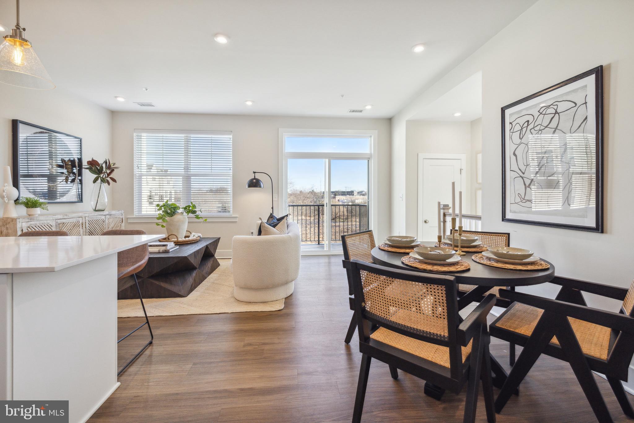 17 Mainland Road, Unit 217 Harleysville, PA 19438 - Photo 12 of 23 a living room with furniture and a table