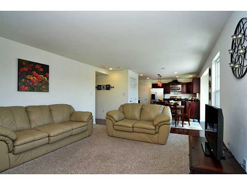 113 Walnut Drive McKees Rocks, PA 15136 - Photo 6 of 21 Family Room. The family room opens to the kitchen.