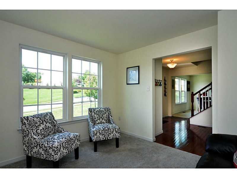 113 Walnut Drive McKees Rocks, PA 15136 - Photo 9 of 21 Living Room. The living room opens to the foyer. A powder room sits next to the living room.