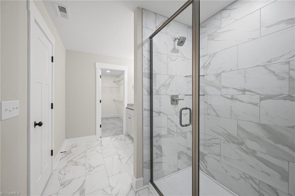 4308 Old Lexington Road Winston-Salem, NC 27107 - Photo 22 of 34 Primary bathroom tile shower