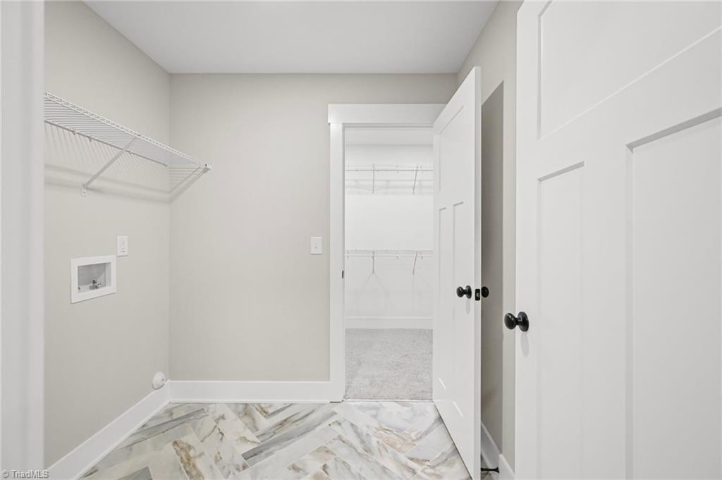 4308 Old Lexington Road Winston-Salem, NC 27107 - Photo 25 of 34 Laundry room and door into primary closet