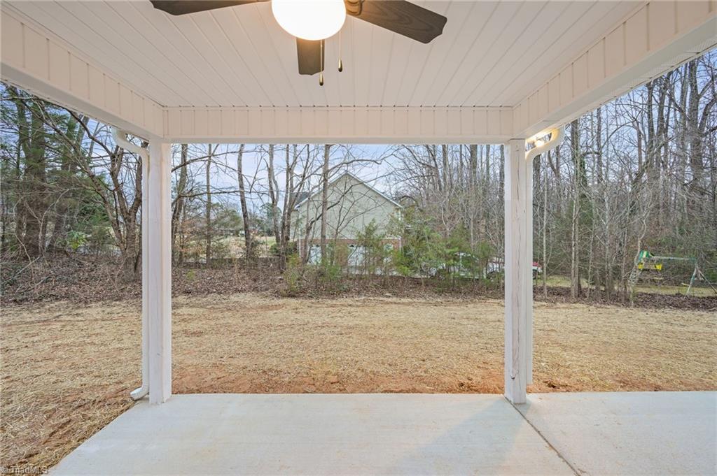 4308 Old Lexington Road Winston-Salem, NC 27107 - Photo 5 of 34 Covered back patio with additional concrete