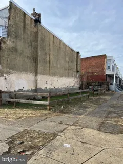 a view of pool with a yard