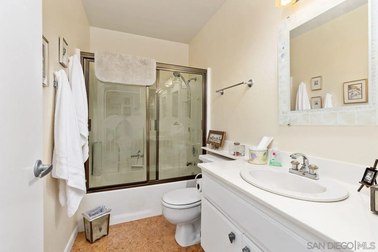 839 Mistletoe Lane Carlsbad, CA 92011 - Photo 11 of 50 a bathroom with a sink toilet and shower