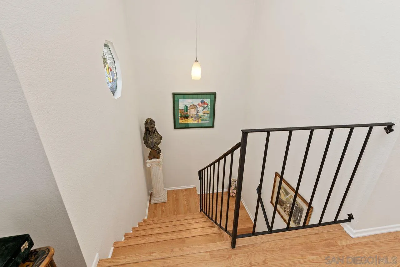 839 Mistletoe Lane Carlsbad, CA 92011 - Photo 12 of 50 a view of entryway with stairs and wooden floor