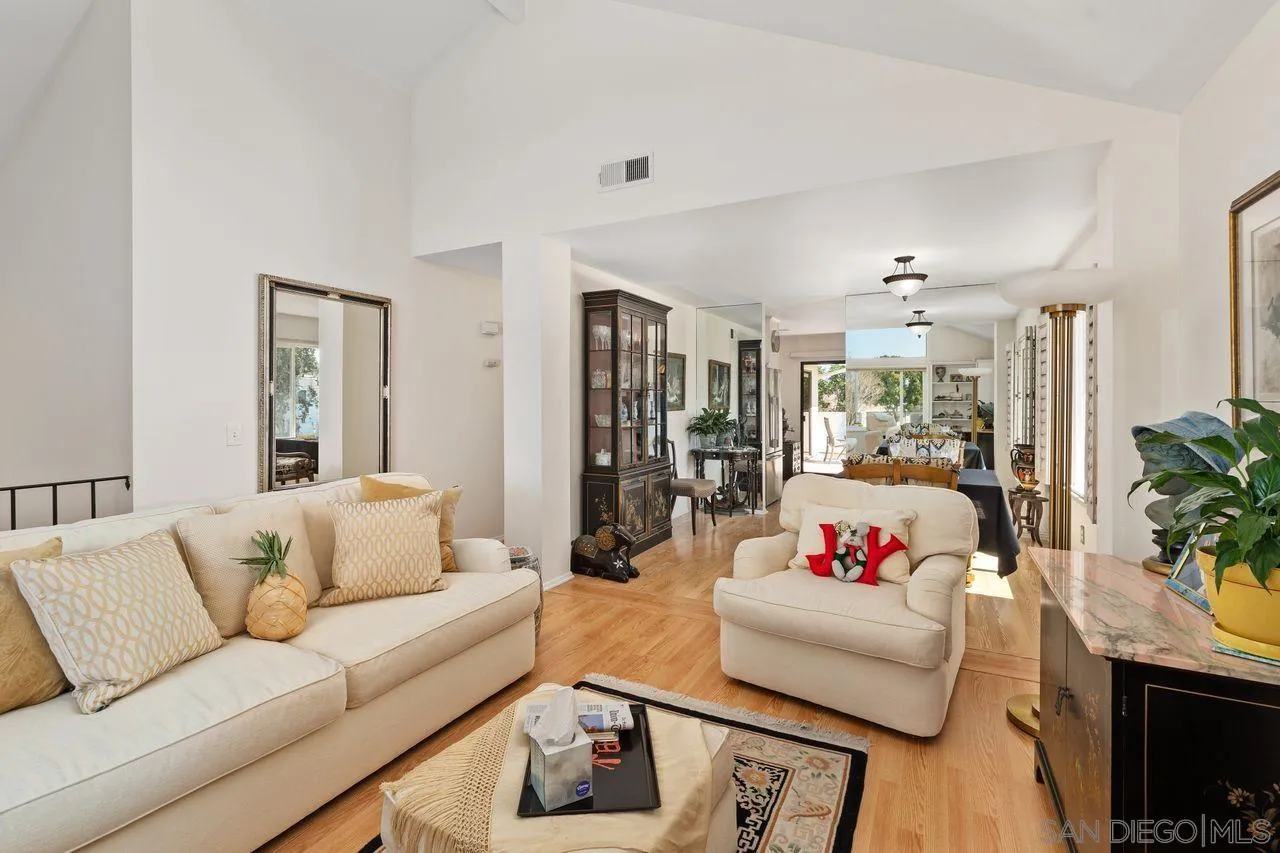 839 Mistletoe Lane Carlsbad, CA 92011 - Photo 16 of 50 a living room with furniture and a flat screen tv