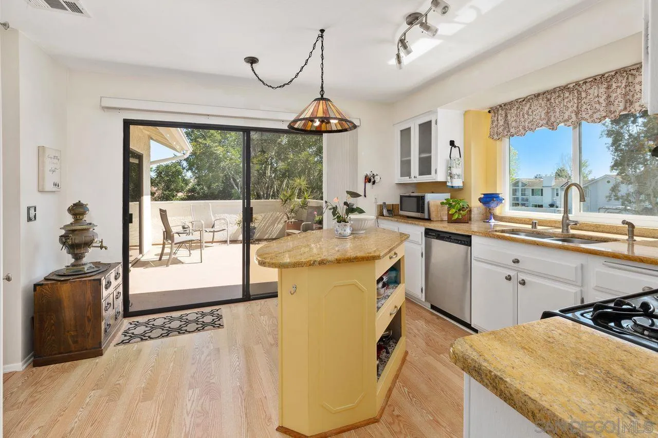 839 Mistletoe Lane Carlsbad, CA 92011 - Photo 19 of 50 a kitchen with sink and window