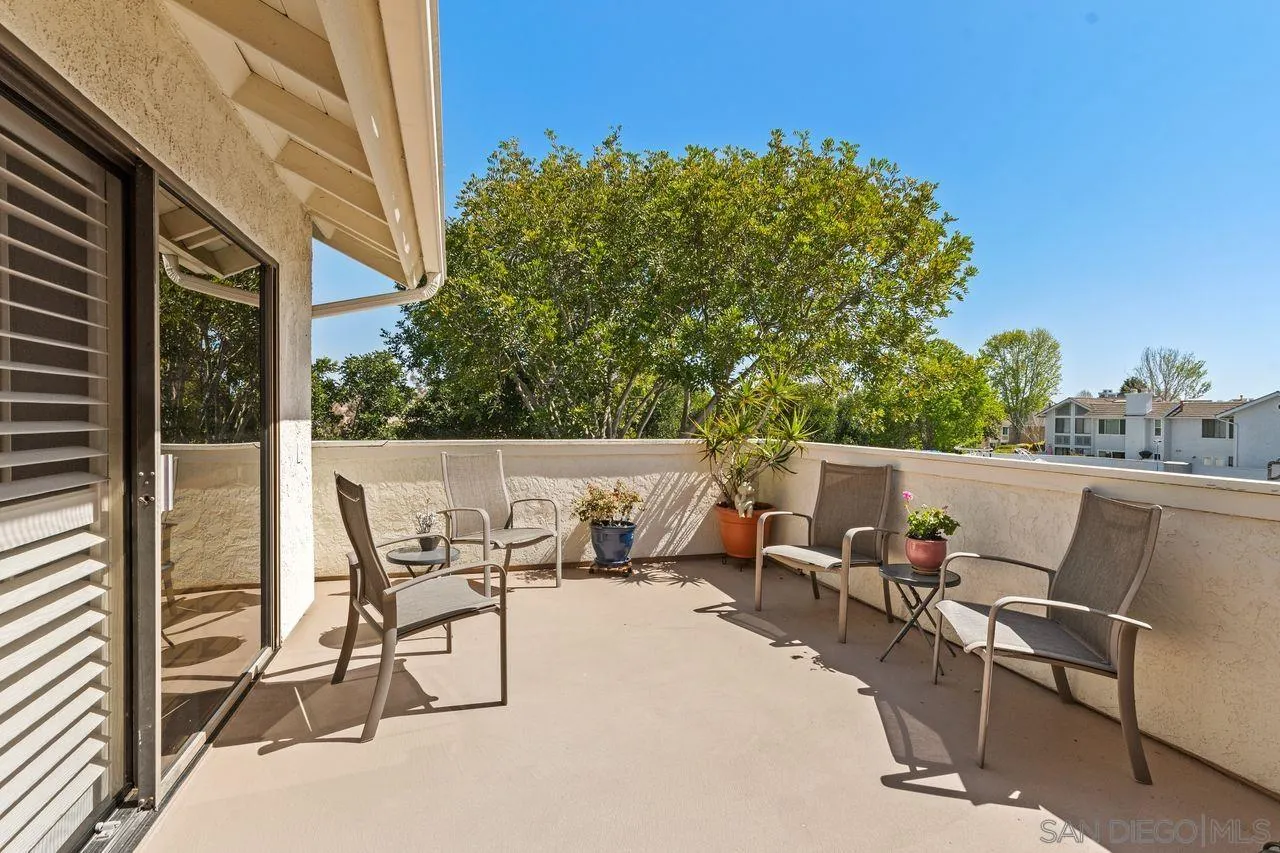 839 Mistletoe Lane Carlsbad, CA 92011 - Photo 22 of 50 a patio with table and chairs