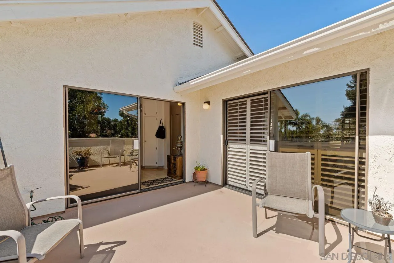 839 Mistletoe Lane Carlsbad, CA 92011 - Photo 24 of 50 a balcony with table and chairs