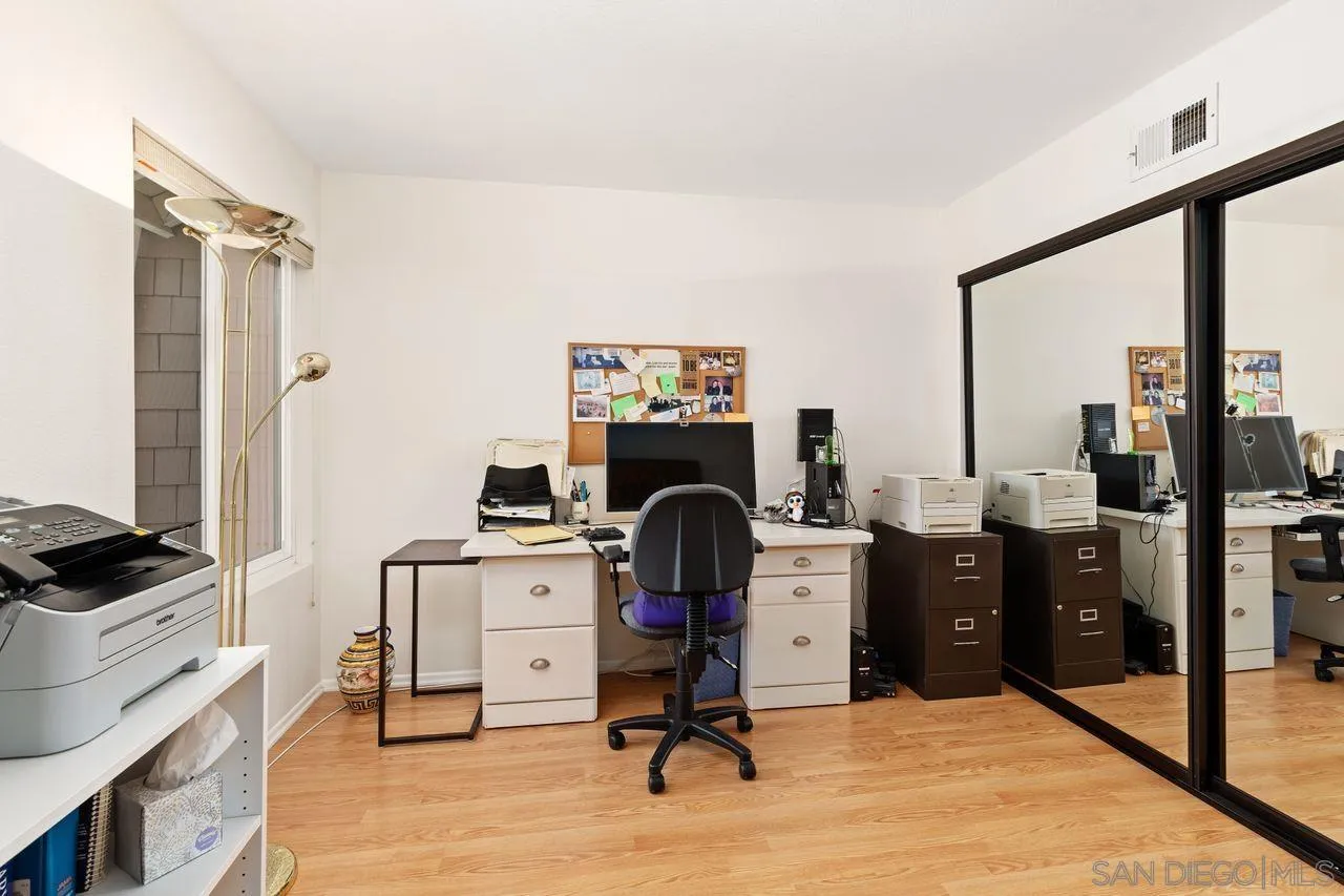 839 Mistletoe Lane Carlsbad, CA 92011 - Photo 27 of 50 a view of a workspace with furniture and a window