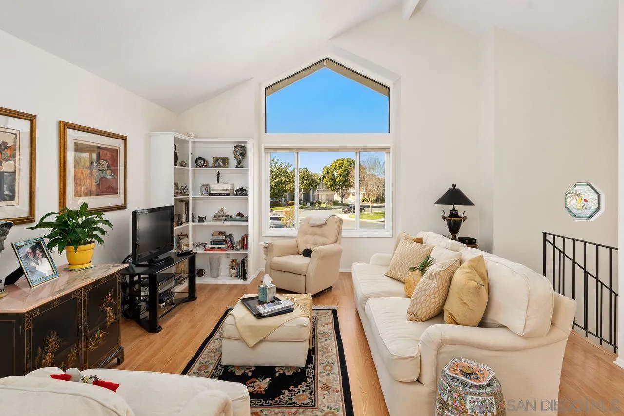 839 Mistletoe Lane Carlsbad, CA 92011 - Photo 28 of 50 a living room with furniture and a flat screen tv