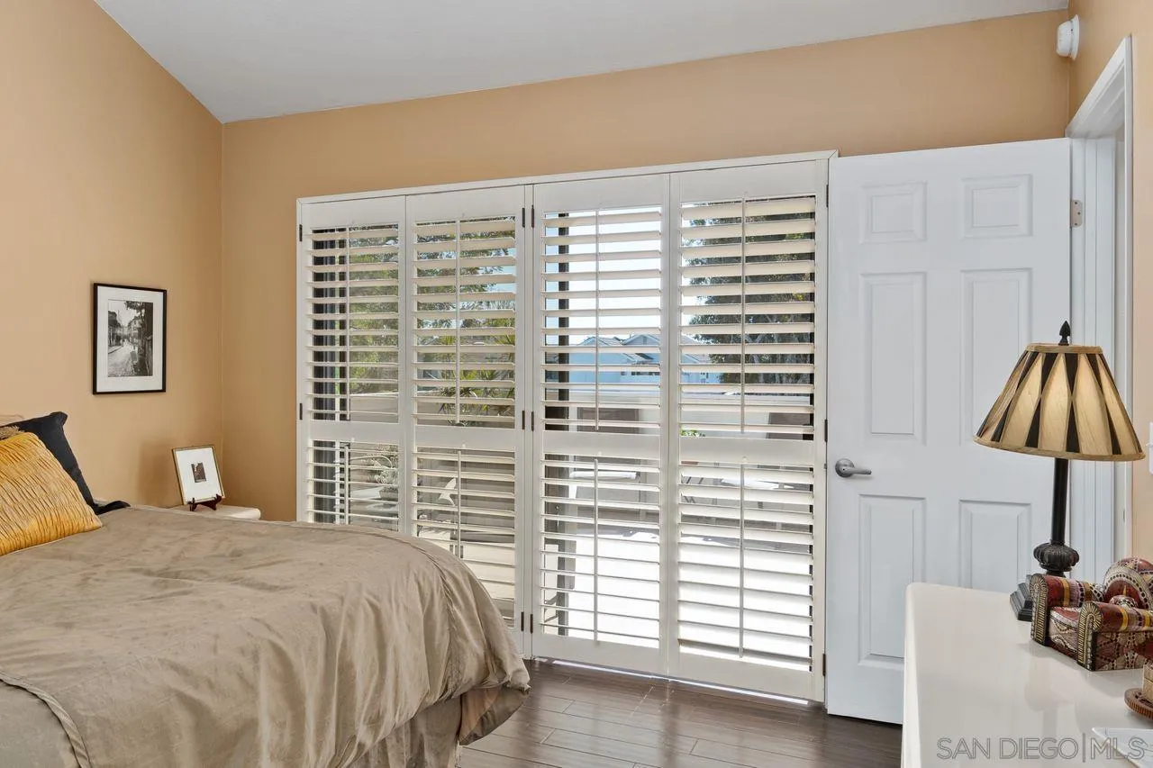 839 Mistletoe Lane Carlsbad, CA 92011 - Photo 32 of 50 a bedroom with a bed and a window