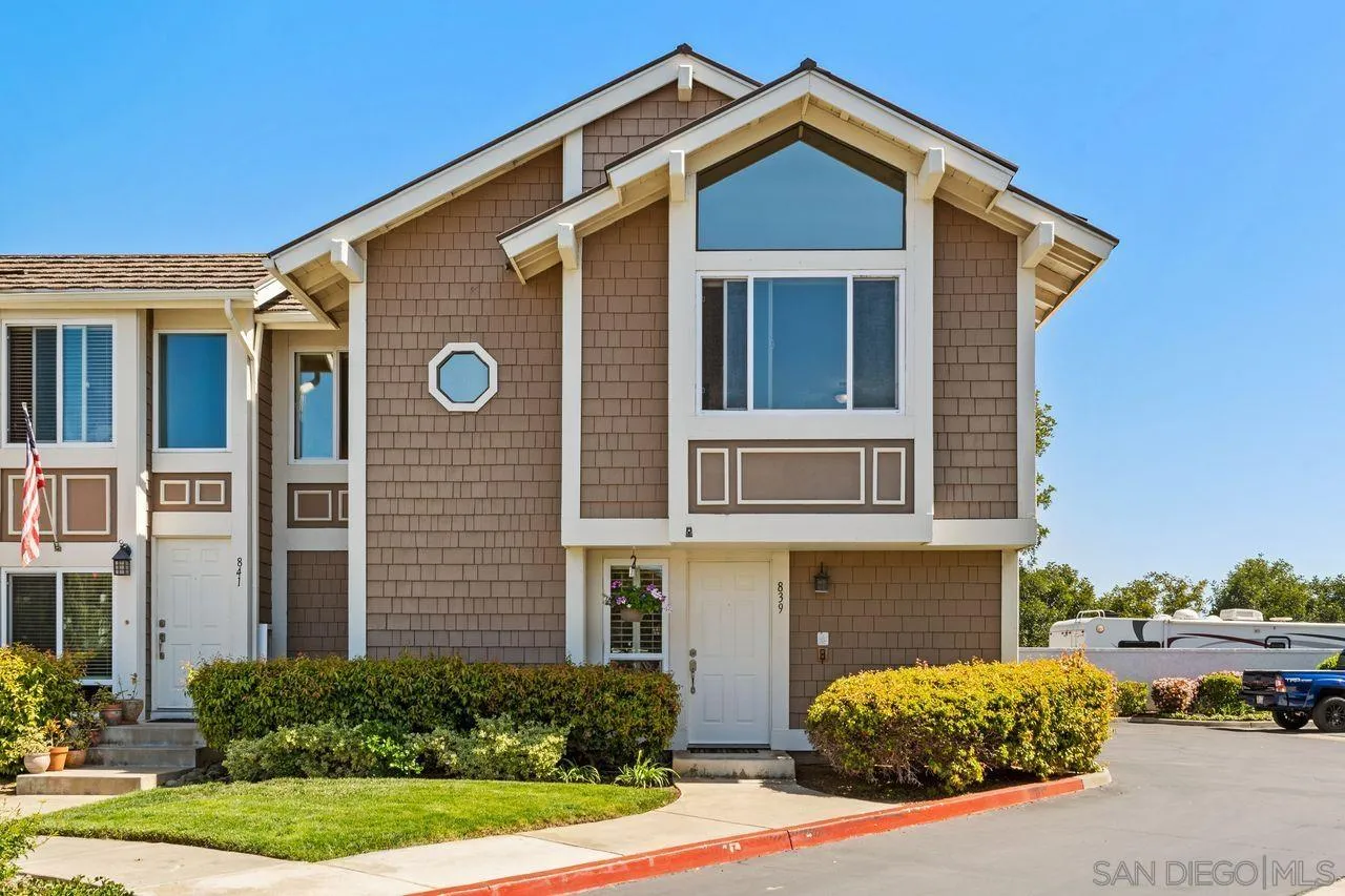 839 Mistletoe Lane Carlsbad, CA 92011 - Photo 34 of 50 a front view of a house with a yard