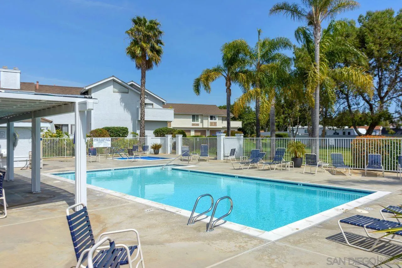 839 Mistletoe Lane Carlsbad, CA 92011 - Photo 49 of 50 a view of a house with pool and chairs
